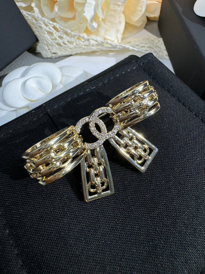 [Star Jewelry]25K Hollow Bow Brooch